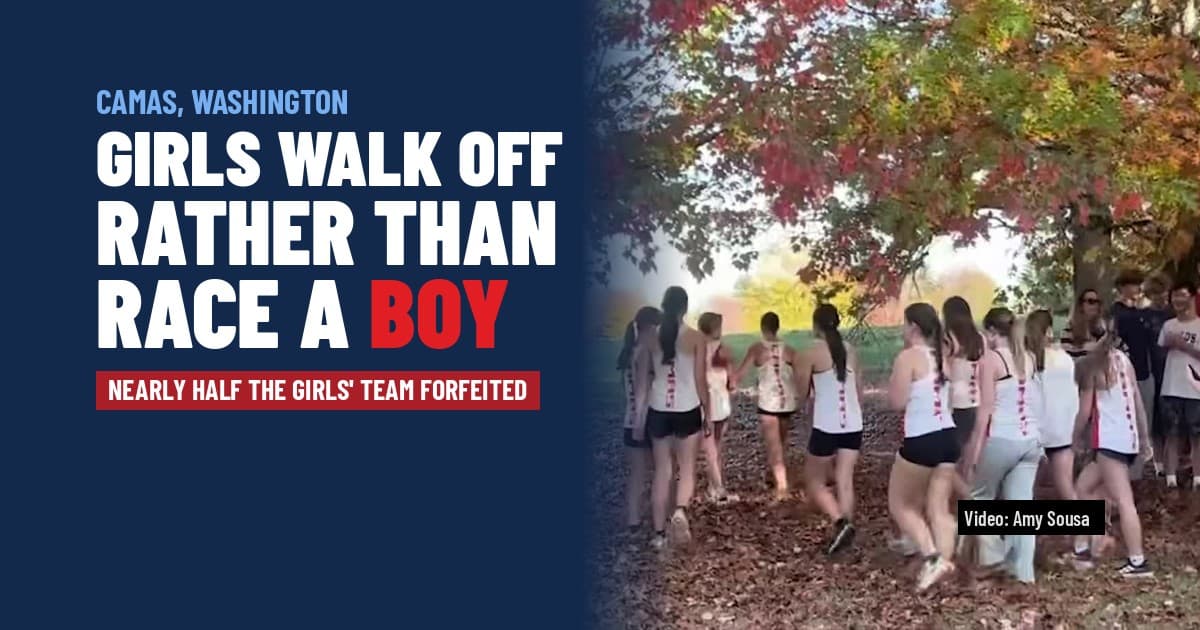 Camas High girls' cross-country runners in team uniforms walk together under autumn trees after forfeiting their race